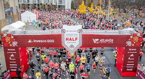 2026 Invesco QQQ Thanksgiving Day Half Marathon, 5K, Mile & Dash logo