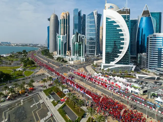 Doha Marathon by Ooredoo logo
