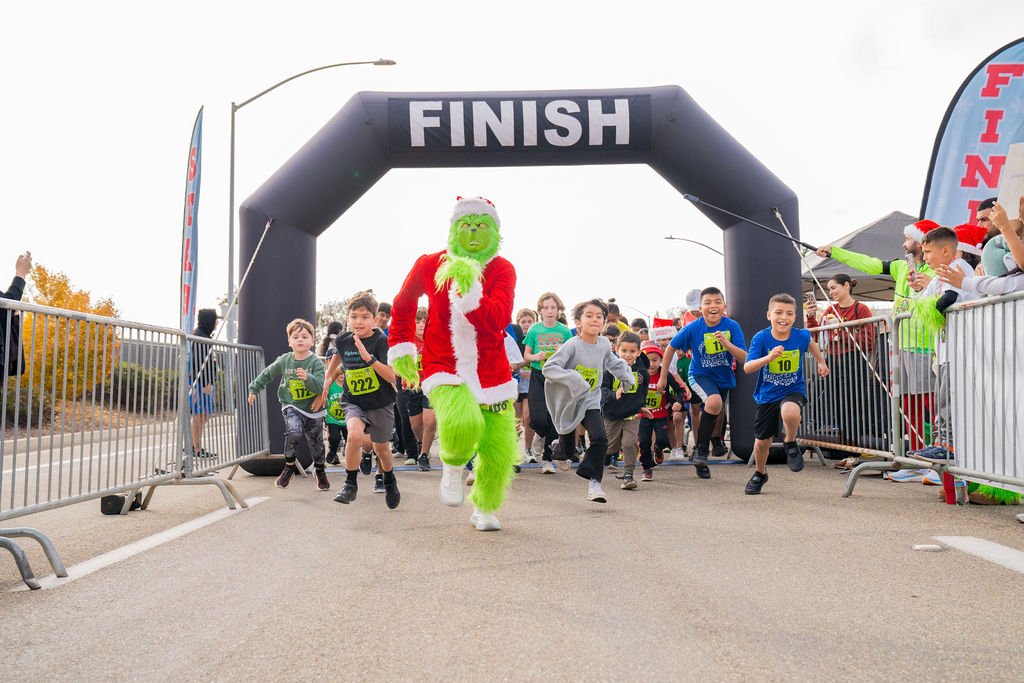 Grinchmas Fun Run/Walk 5K - Youth Grinchmas 5k Participant (17 & Under) Logo