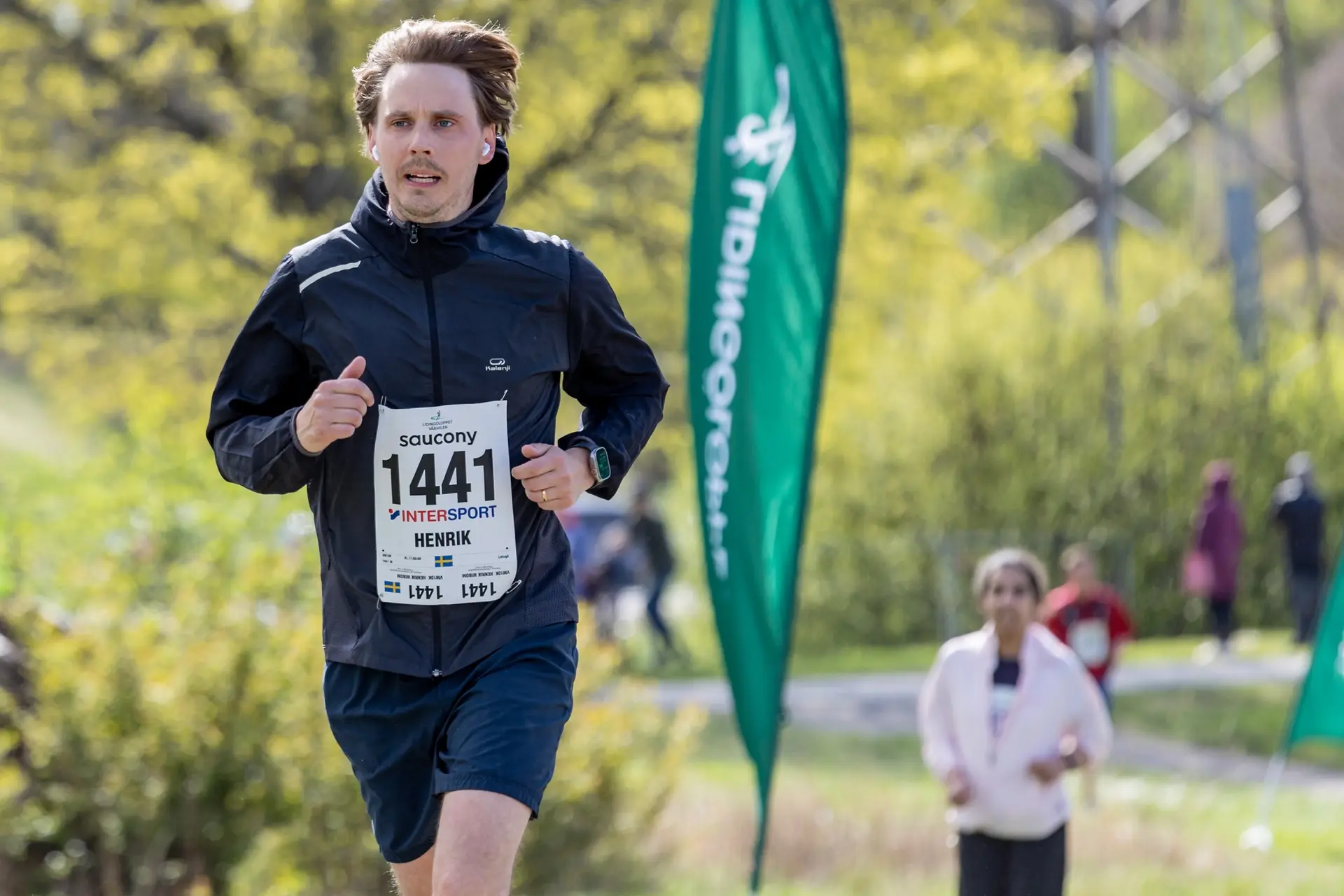 Lidingöloppet Vårmilen Logo