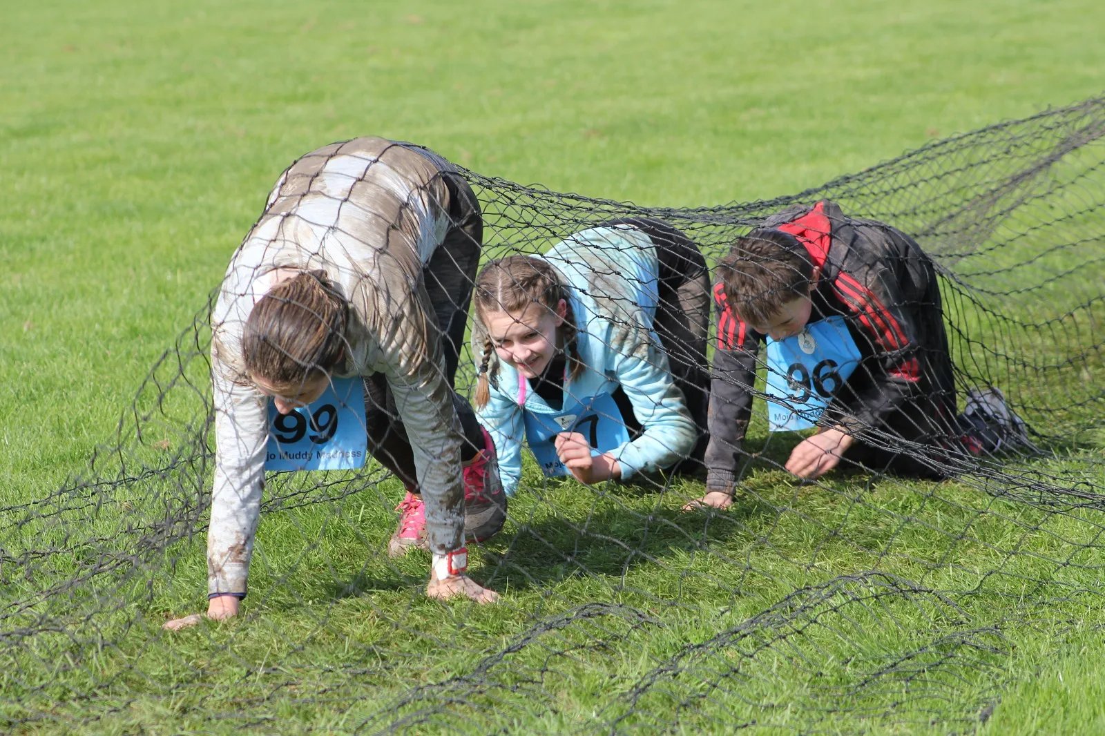 Mojo Active's "Muddy Madness" Obstacle run 5k, 2k Logo