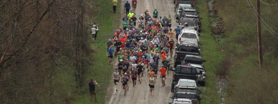Muddy Sneaker 20K Trail Run Logo