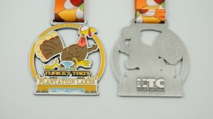 Plantation Lakes Turkey Trot | Presented by JTE Real Estate Logo
