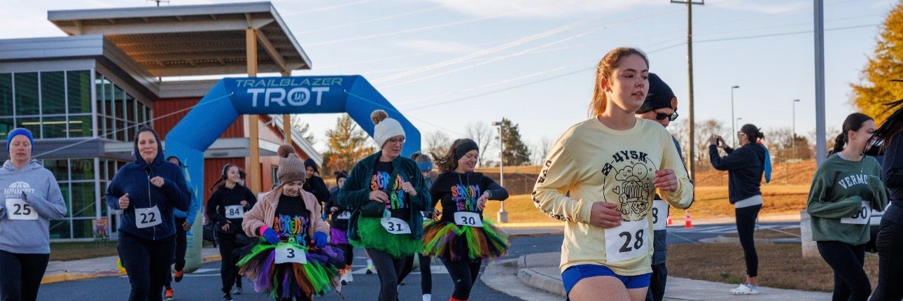 Trailblazer Trot 5K and The Monster Mile Logo