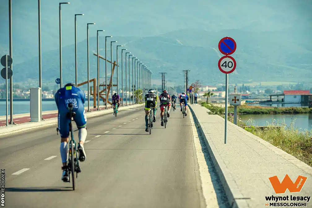 whynot legacy - Messolonghi Triathlon Logo